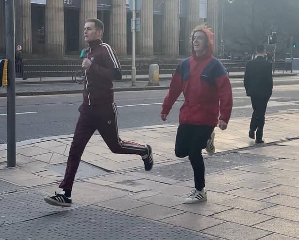 Lewis and Forbes running along Princes Street on Monday, January 15. Photo by Rebeka Thomson.