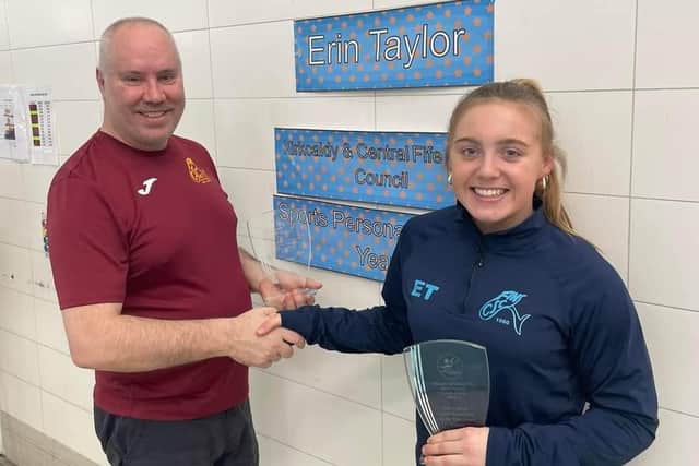 Swimmer Erin Taylor being given her Kirkcaldy and Central Fife Sports Council awards by her coach Ian Lewis at Kirkcaldy Pool