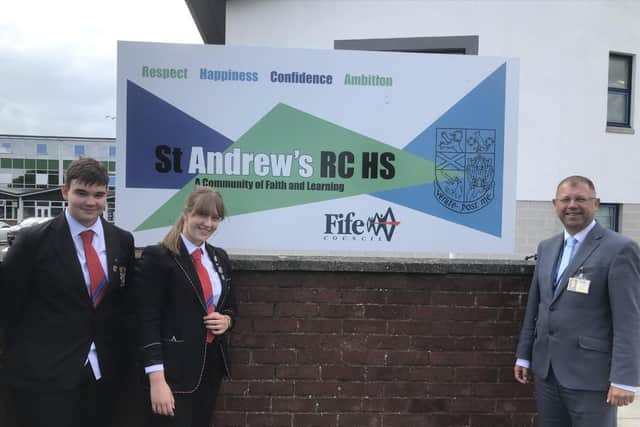 Pictured with Mr Callaghan, headteacher, are newly appointed Head Boy and Head Girl, Daniel Martin and Hanna Waciega, who achieved five and six A passes respectively in their Higher courses last year.