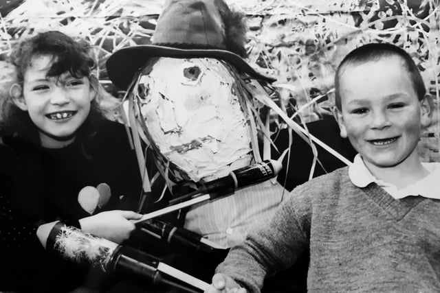 Bonfire Night 1993, and pictured with the Guy set for Glenrothes Round Table's annual bonfire at Warout Stadium, Glenrothes, are Sarah Wilson (aged 8) and seven-year old Hugh Lambie from Southwood Primary School. Glenrothes