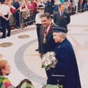The Queen came to Glenrothes in 1998 for the town's 50th anniversary celebrations. She is pictured with Councillor John MacDougall, leader of Fife Council, talking to crowds in the Kingdom Centre.
