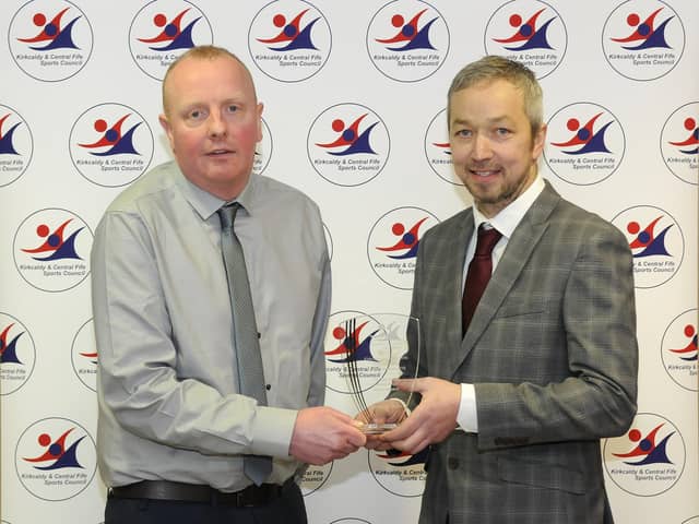 Gordon Moodie (right) receives his Senior Award from Paul Hossack of Fife Sport & Leisure Trust. Pic: Paul Cranston