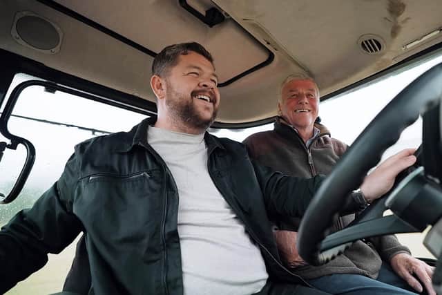 Grado with Mr B owner of Lindores as Grado gets behind the wheel of a tractor to bring in the bales at Lindores, Fife.  (Pic: Red Sky Productions/BBC Scotland)