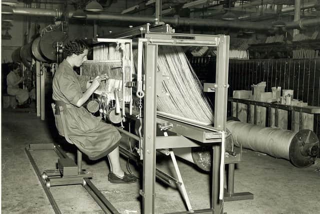 One of the workers drawing in at the factory in its early days. (Pic: Peter Greig & Co)