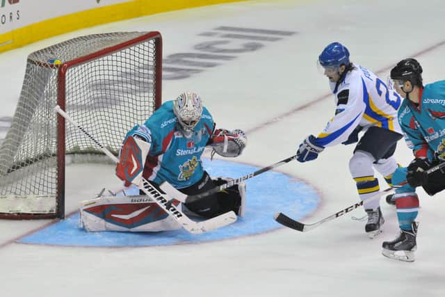 Stephen Murphy icing for Belfast Giants against Fife Flyers at the 2014 EIHL championship play-offs (Pic: Richard Davies)