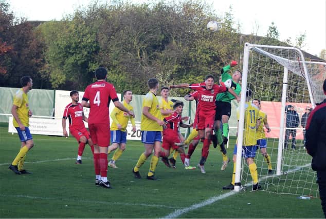 Goalmouth action from Saturday's resounding win.
