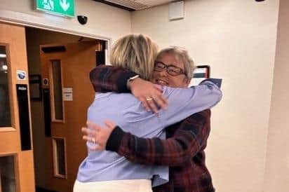 Zoe Hisbent embraces wife Leanne after her by-election success.