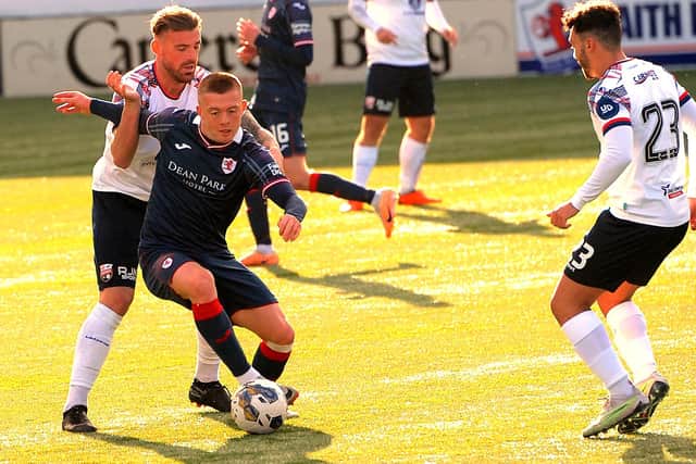 Callum Smith going up against Kerr Waddell during Raith Rovers' 3-1 SPFL Trust trophy fourth-round win at home to Montrose on Saturday (Pic: Fife Photo Agency)