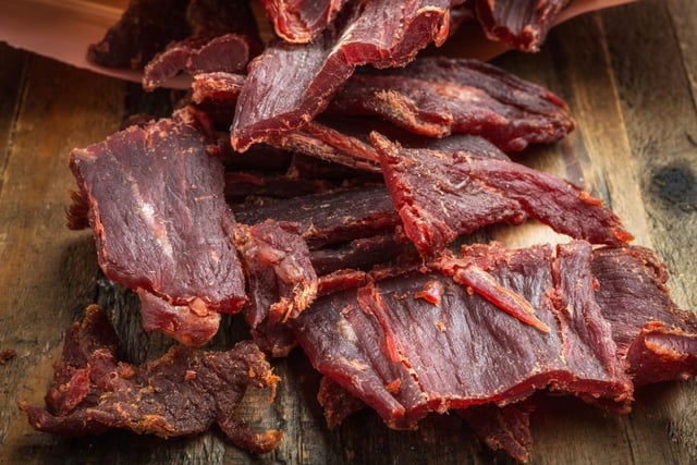 Chewy beef jerky will give your dog some time to consider just how they managed to get their treat. Just make sure it doesn't contain additional unhealthy salt or additives like chilli, which can cause health issues with canines.