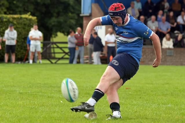 Ethan Murray kicking one of his four conversions v Gordonians