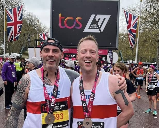 Andy Harley and Sean Brown pictured after finishing the London Marathon