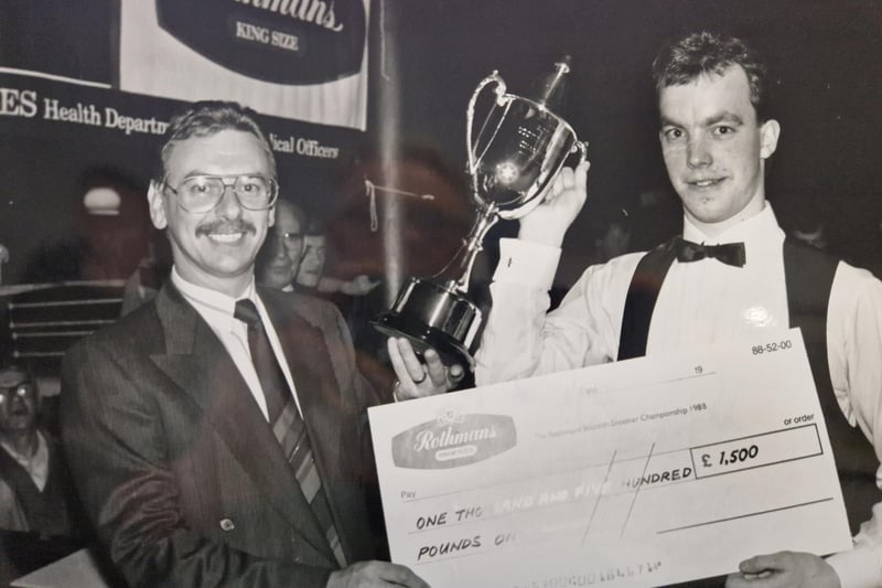 Trophy time in 1988 for Euan Henderson as he receives a trophy from Rothmans’ representative at the Reardon’s Club in Glasgow