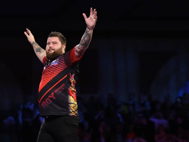 Michael Smith of England reacts during his Quarter-Finals Match against Gerwyn Price at the William Hill World Darts Championship at Alexandra Palace (Photo by Luke Walker/Getty Images)