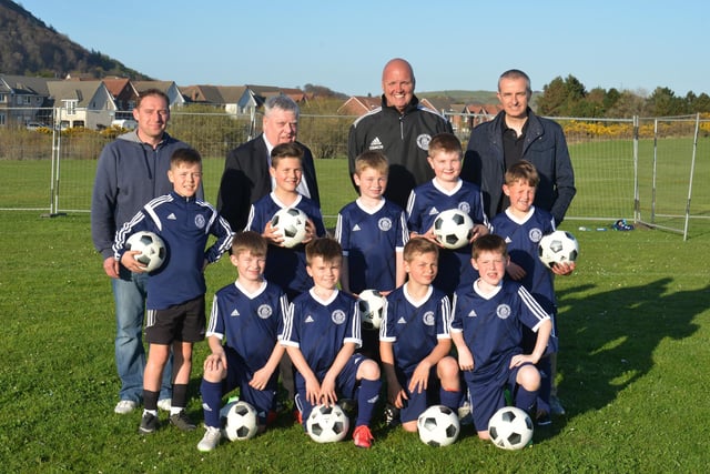 Youngsters from Burntisland Shipyard under 9s and local councillor George Kay at the site of two new football pitches at Seamill in Burntisland in 2015. From left,  Mike Hoy coach,  Cllr George Kay, Lee Mahady coach and sponsor Grant Sharp.