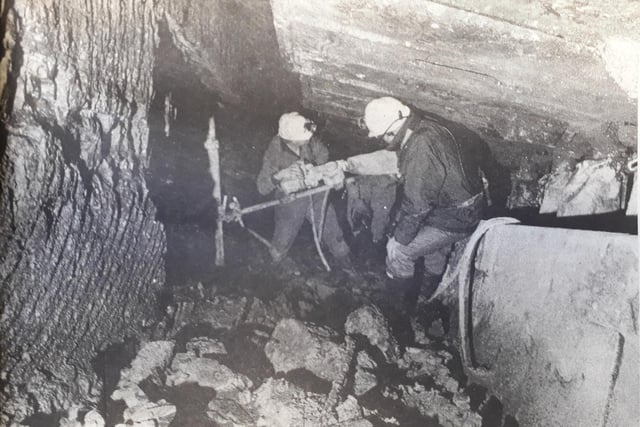 Workers at Kirkcaldy's Seafield Colliery pumping liquid cement into the rock face in 1985
