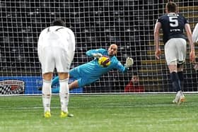 Raith Rovers goalkeeper Jamie MacDonald saving a penalty kick by Ayr United's Ben Dempsey (Pic: Fife Photo Agency)