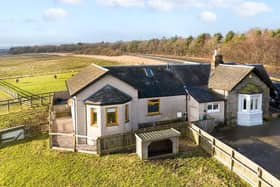 The detached listed lodge house with excellent equestrian facilities is set within 2.25 acres.