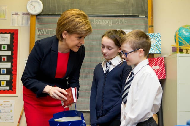 Back to school ... the First Minister on a visit to  Warout Primary School in Glenrothes. 
She was shown around by P7 pupil Adam Murray and P6 pupil Kerry Johnstone