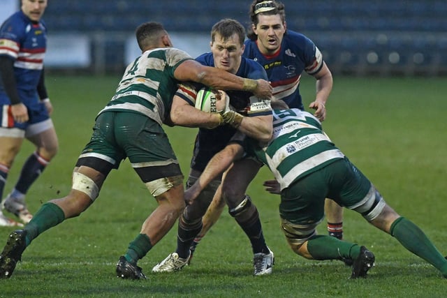 Knights’ John Kelly is thwarted by the Ealing defence.