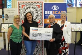 The picture shows Carralanne and Karen from Seescape receiving a presentation cheque from Liz Banks, Langtoun Singers’ chair, and Ella Wilson (Pic: Submitted)