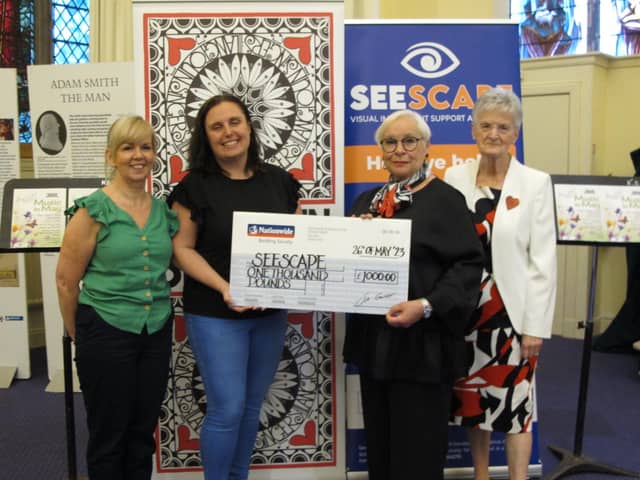 The picture shows Carralanne and Karen from Seescape receiving a presentation cheque from Liz Banks, Langtoun Singers’ chair, and Ella Wilson (Pic: Submitted)