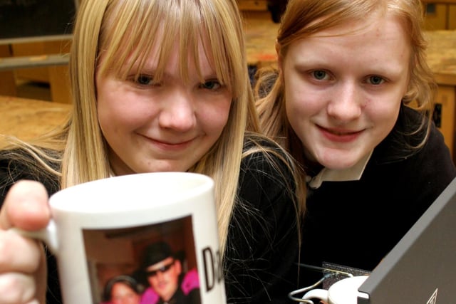 Melanie Rowbotham and Gemma Snell, pupils at Brookfield School, with mugs made for a technology youth award