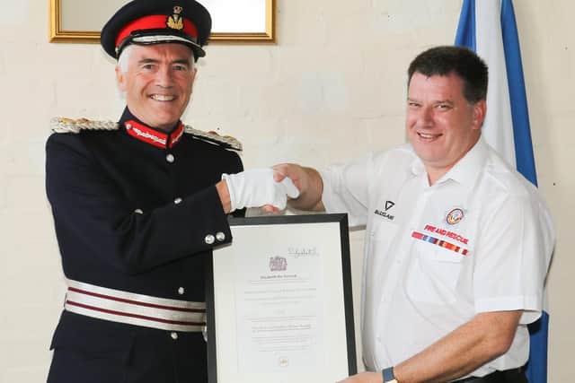 Robert Balfour, Lord Lieutenant with David Kay after IFRA was presented with the Queen's Award for voluntary services.