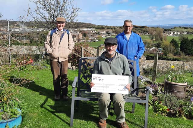Inverkeithing Community Garden volunteers - Ian Shepherd, Ian Walker, Paul Francis with their donation from Taylor Wimpey East Scotland.