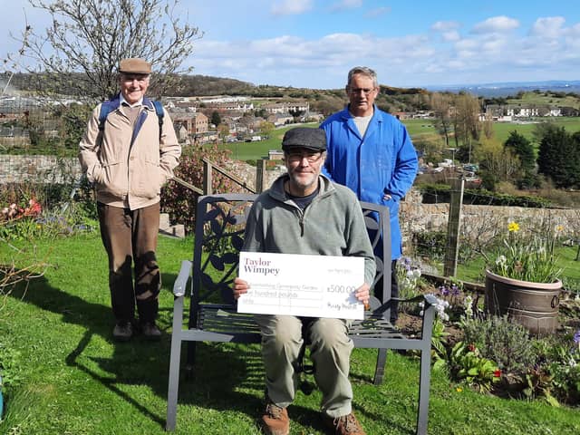 Inverkeithing Community Garden volunteers - Ian Shepherd, Ian Walker, Paul Francis with their donation from Taylor Wimpey East Scotland.