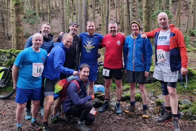 Runners at finish line of Falkland Yomp 11km trail race