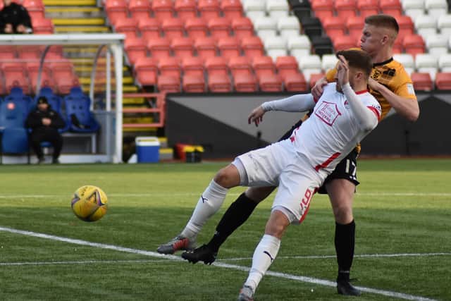 Aaron Steele ensures there's no way through for David Goodwillie