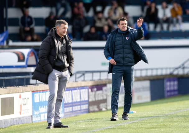Raith boss Ian Murray (right) pictured with Cove manager Jim McIntyre on Saturday Pic by Sammy Turner/SNS Group