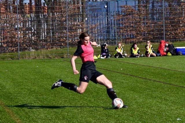 Rebecca is hoping to raise the cash to follow her dreams in becoming a professional football player.