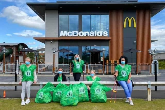 Staff from Glenrothes McDonald's with some of the rubbish that they collected.
