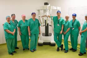 Members of NHS Fife's theatres team alongside the Da Vinci robotic device (Pic: NHSFife)