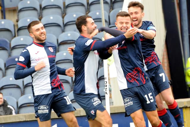 Team mates congratulate Raith's Dylan Tait (number 15) after he opens the scoring against Arbroath (picture by Fife Photo Agency)