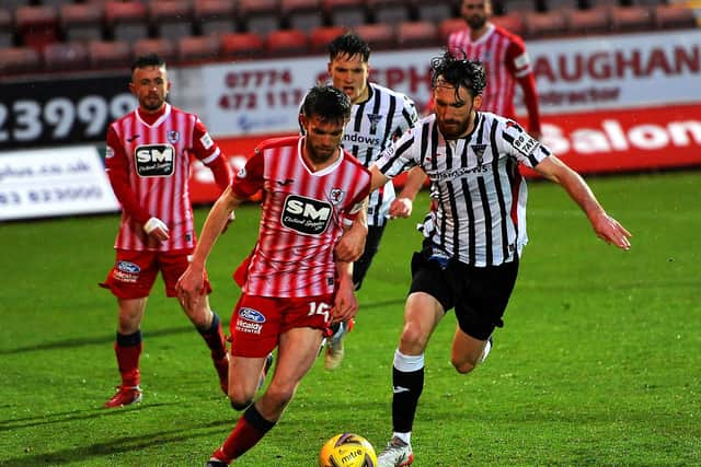 Stanton is shadowed by Dunfermline's Joe Chalmers.