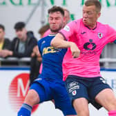 Cove Rangers' Mitch Megginson tackling Raith Rovers' Scott Brown during their sides' Scottish Championship match at Balmoral Stadium in Aberdeen in July (Photo by Craig Foy/SNS Group)