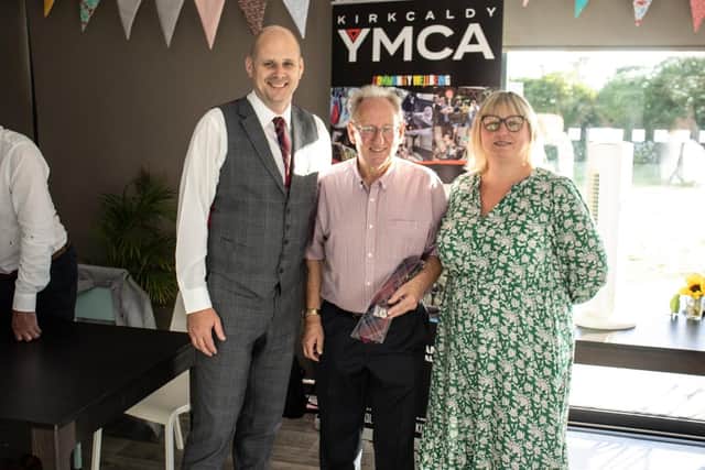 Robert was presented with the YMCA tie to make 50 years with the organisation (Pic: Submitted)