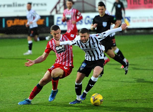 Ross Matthews challenges during Wednesday night's defeat to Dunfermline. (All pics: Fife Photo Agency)