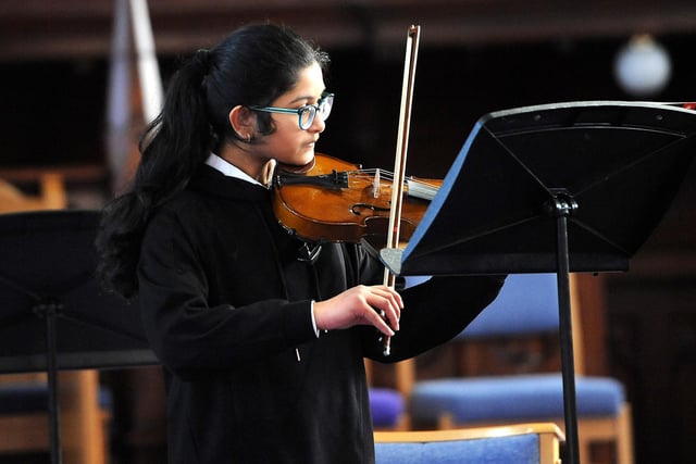 String soloist Reema Chaman Fazludeen, from Inverkeithing  High School, plays at Kirkcaldy's St Bryce Kirk.