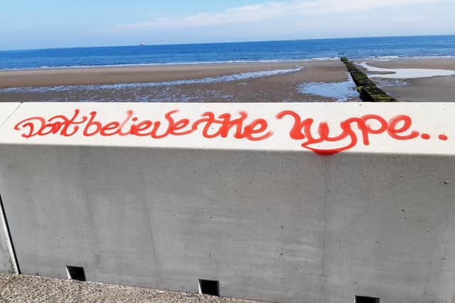 'Don't believe the hype' slogan spray-painted on the wall at Kirkcaldy waterfront - one of a number of acts of vandalism reported to the police