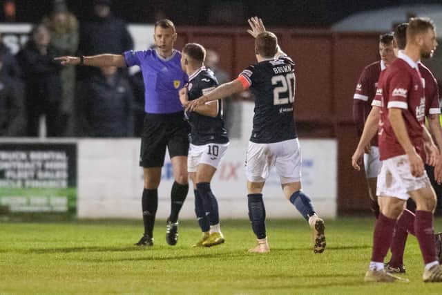 LINLITHGOW, SCOTAND - JANUARY 24: Referee Graham Grainger awards the free kick for offside during a Scottish Cup fourth round match between Linlithgow Rose and Raith Rovers at Prestonfield, on January 24, 2023, in Linlithgow, Scotland. (Photo by Mark Scates / SNS Group)