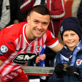 Ross Matthews with young Raith fan, Alexander Daly. (Pic: Fife Photo Agency)