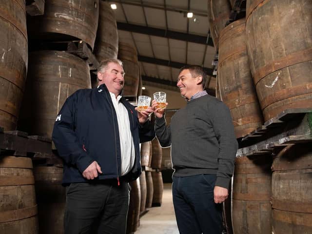 Keith Rennie, managing director for Scotch Whisky Investments and Barry Anderson, Business Operations Manager toast the opening of the new facility in Glenrothes.  (Pic: Paul Chappells)
