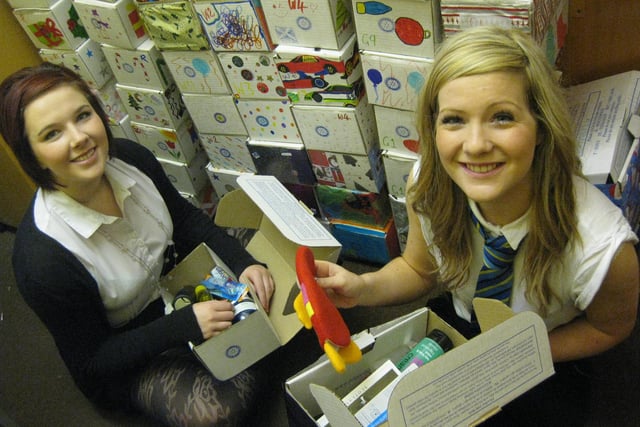 Auchmuty High School gave generously to the Rotary Club Shoebox Appeal. Sixth year pupils, Rebecca Mallis (right) and Kay.