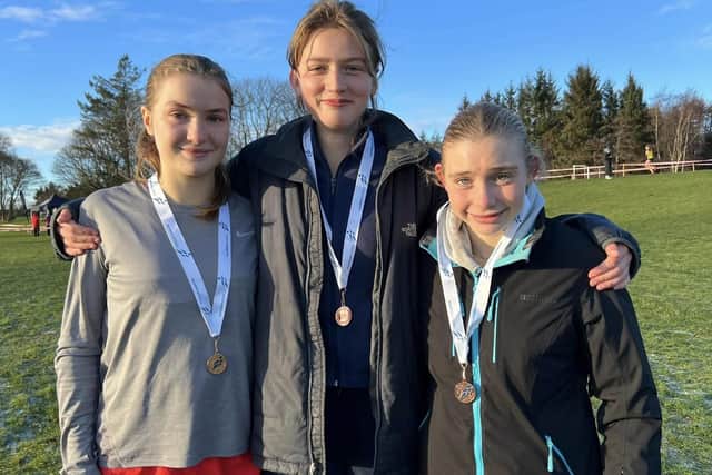 Fife Athletic Club's Katie Sandilands, Nellie Luxford, centre, and Eliza Konig, right, won a bronze medal at Saturday's east district cross-country championships in Aberdeen, finishing as the third under-17 girls' team overall
