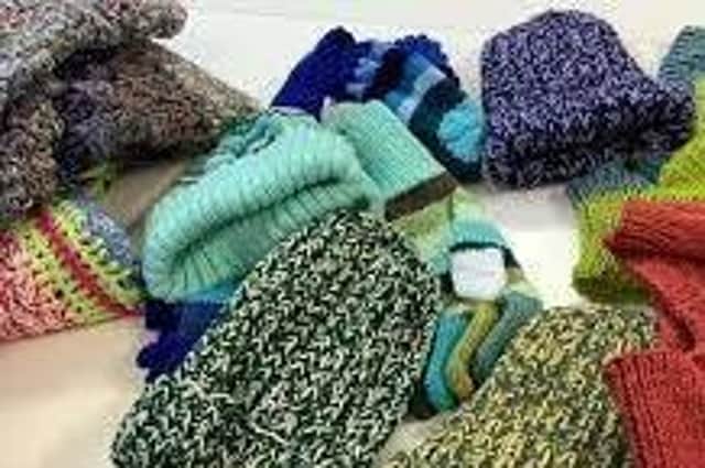 Some of the knitted items that will go to support others including the homeless and premature babies.