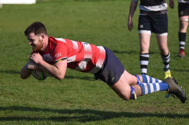 Jake Douglas, making his 100th appearance for Howe of Fife's first XV, scoring his third try, and the club's 14th, against Perthshire on Saturday (Pic: Chris Reekie)