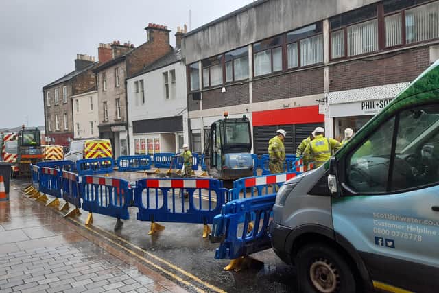 Workmen tackling a burst pipe which closed part of Kirkcaldy High Street (Pic: Fife Free Press)